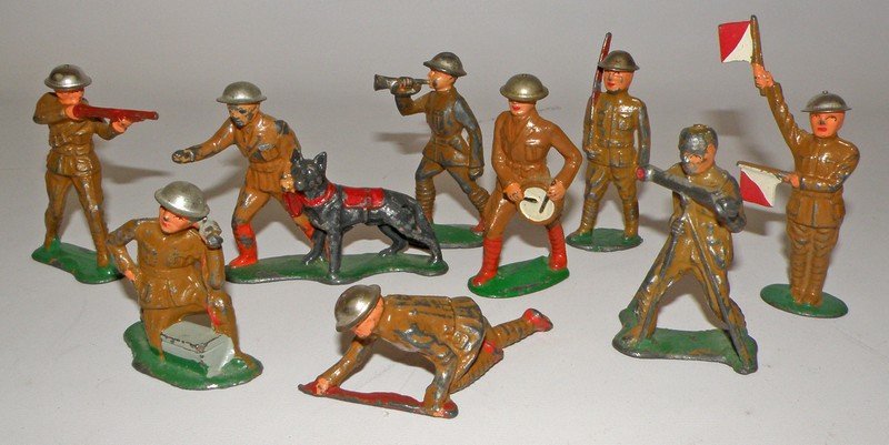 TEN LEAD SOLDERS: All by Barclay. Includes dog handler etc. One figure missing helmet. Scattered paint wear. varies
