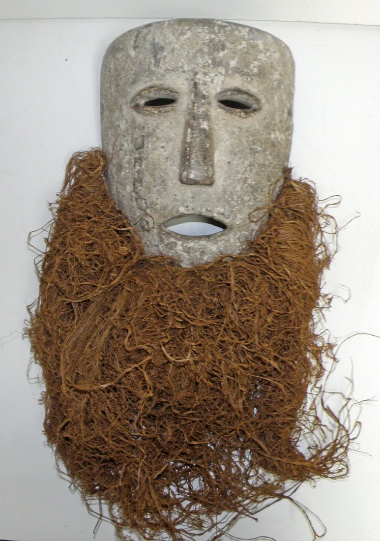 METKO MASK: The Metko and Lengola people live on the left bank of the Zaire River in an area that is densely wooded. Old medal staple repair, original kaolin surface 11" Tall