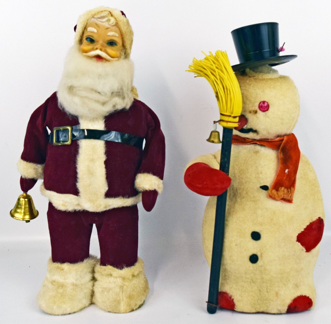 TWO BATTERY OPERATED TOY: Bell ringing Santa Claus. A Snowman. Both toys work. Largest is 13'' tall