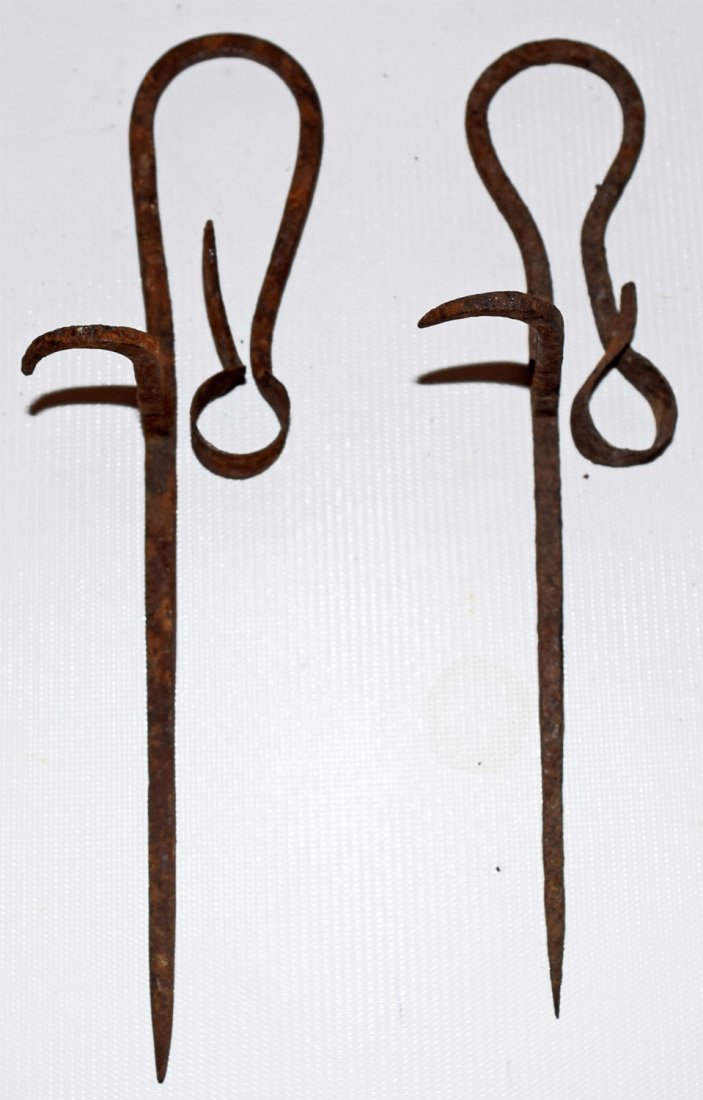 TWO WROUGHT IRON CANDLE HOLDERS (1 of 3)