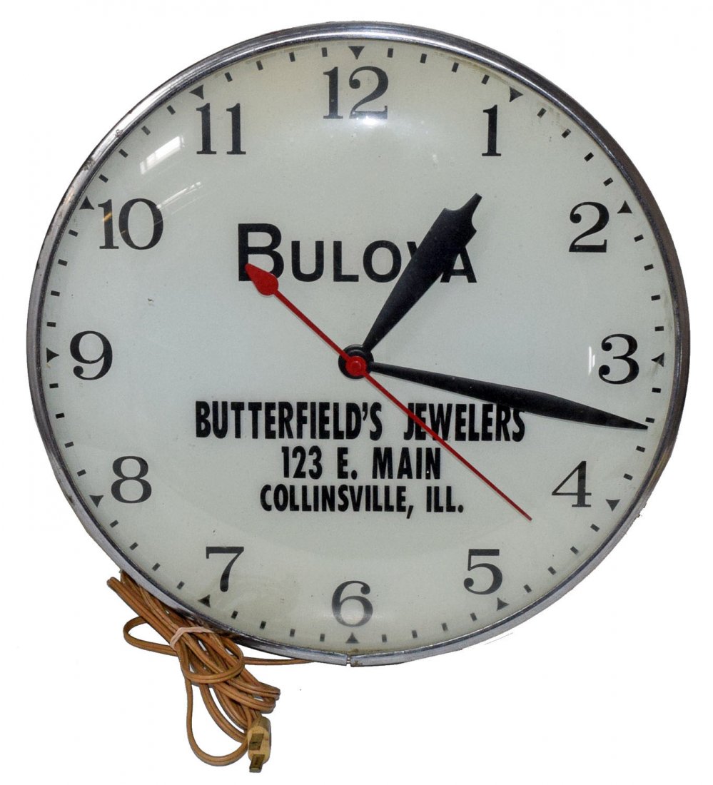 BUTTERFIELD'S JEWELERS ADVERTISING CLOCK: Advertising Bulova products. Working clock from Collinsville, Ill. Needs new bulbs. Some age wear. 15'' tall