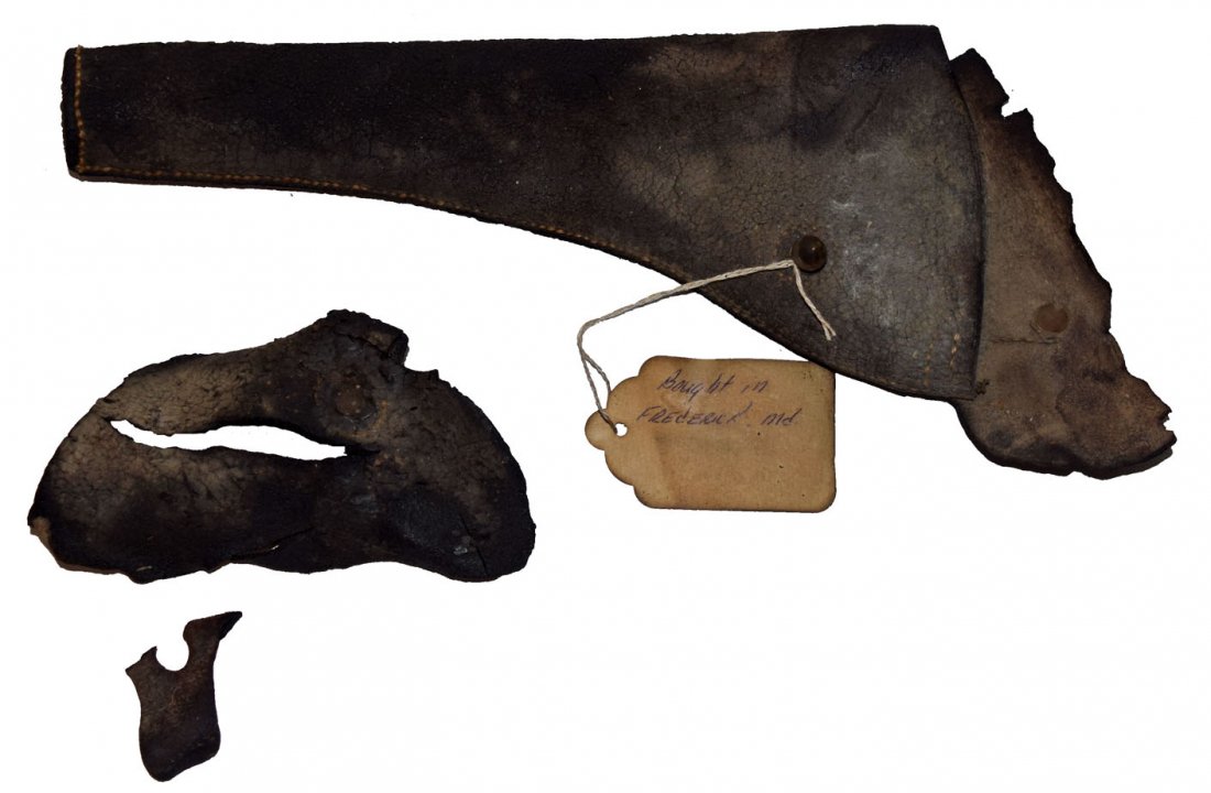CIVIL WAR ARMY REVOLVER HOLSTER: Made by William White. Shows wear and damage. Acquired in Frederick, Maryland. 13'' tall