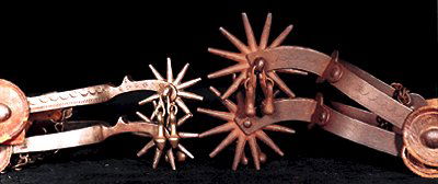 2 Pairs of Buermann "1877 Patent" marked: 2 Pairs of Buermann "1877 Patent" marked iron Spurs (a) Catalog Pat No. 1218, 27/8" - 12 pt rowels, jinglebobs, slight surface rust, else fine cond (b) Catalog Pat No. 1242, 23/8" - 10 pt rowels, jing