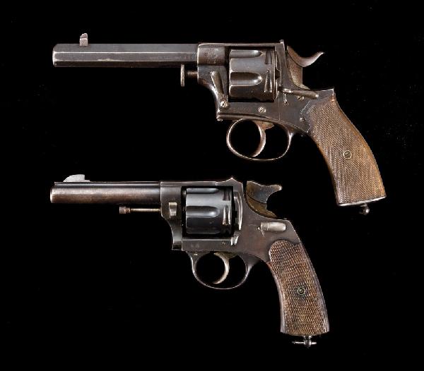 Lot of 2 Revolvers: a) German Webley style double action, 5 3/4 barrel, 80% blue overall turning dark, single action functions very good, double action disabled, S/N 555; b) Spanish double action revolver, model 1915, 8m