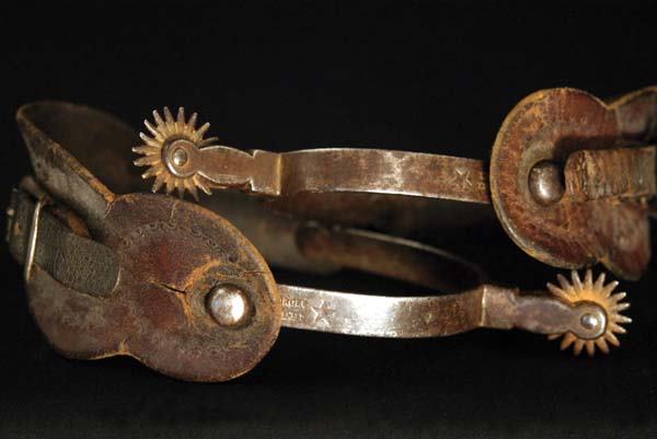 A. Buermann 1880s Spurs: Two pair of very early star marked iron spurs by the prolific Buermann. The first are "Patent Cowboy Spurs" #3026 with 1 5/8" rowel, 70% original nickel, the second are #1275 "Cowpunchers Favorite" wi