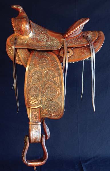 Edward Bohlin Saddle: beautiful color and highly intricate tooling on a fine Hollywood saddle c 1930s. All over top workmanship with rope edges and tooled straps