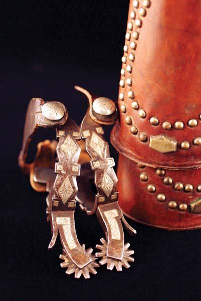 Canon City Prison Spurs: Very unique child's spurs from Canon City Prison. Spurs were made in 1937 for Jack Smith of Cotopaxi, Colorado. Included are Jack's grandfathers H H Heiser leather wrist cuffs, with letters from Jack