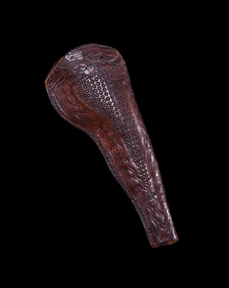Samuel Sherlock Holster: Extremely rare Portland, Oregon maker-mark. c. 1860s. "Slim Jim" style unusual tooling on the front and the makers stamp "Sherlock & Co. Portland ORN" The holster has been restored with the top 2" swe