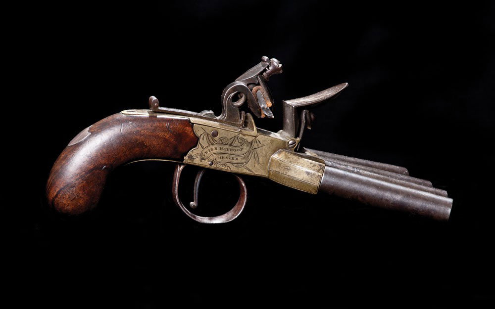 Early and Rare Duck Foot Pistol: Flintlock 4 barrel pistol by Peter Haywood of Chester. Haywood worked as a gunmaker in Chester in 1815. This is a high quality smoothbore in approximately .45 caliber, with engraved brass frame, silve