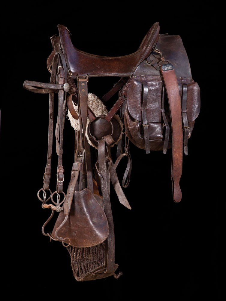 U.S. McClellen Saddle: Model of 1904, with U.S. headstall and original 1865 Shoemaker bit. Complete with horsehair cinch, Spalding-marked saddle bags and taps.