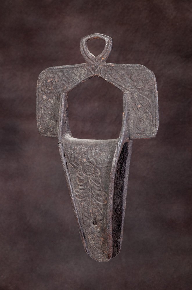 Spanish Colonial Cross Stirrup: 13” x 7 1/2”, 17th century, iron Estribo de Cruz (Stirrup of the Cross). Cruciform stirrups date from the 1600s-1700s, deriving the name from their shape — that of the Latin Cross. Though popula