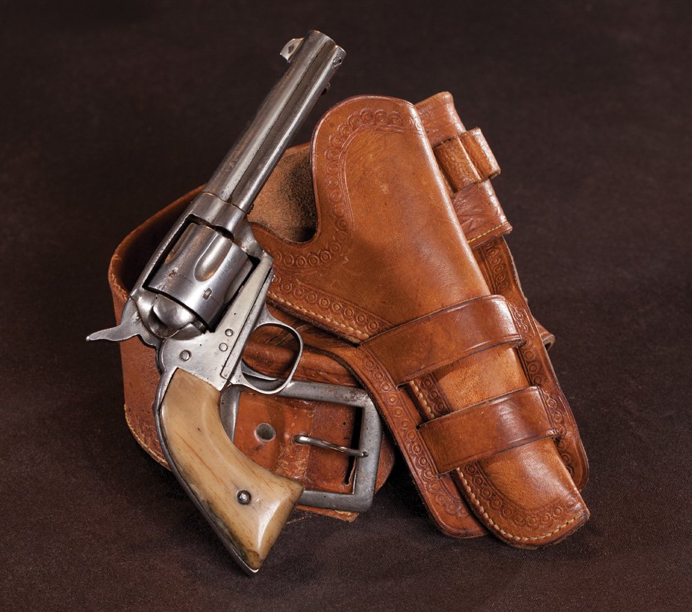 Mexican Colt Single Action Revolver: Antique single action, circa 1880s, made to resemble the Colt SAA, nickel, 4 1/4”, .38 caliber with vintage bone grips. Comes with a period catalog style money belt and holster rig. Belt has .38 loo