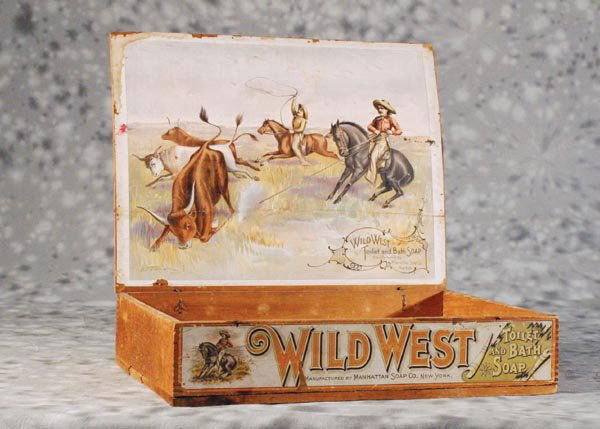 "Wild West" Wooden store display box: for Wild West Toilet and Bath Soap, litho labels with cowboy graphics by A D Turner, 16 x 12 x 3 1/2" closed