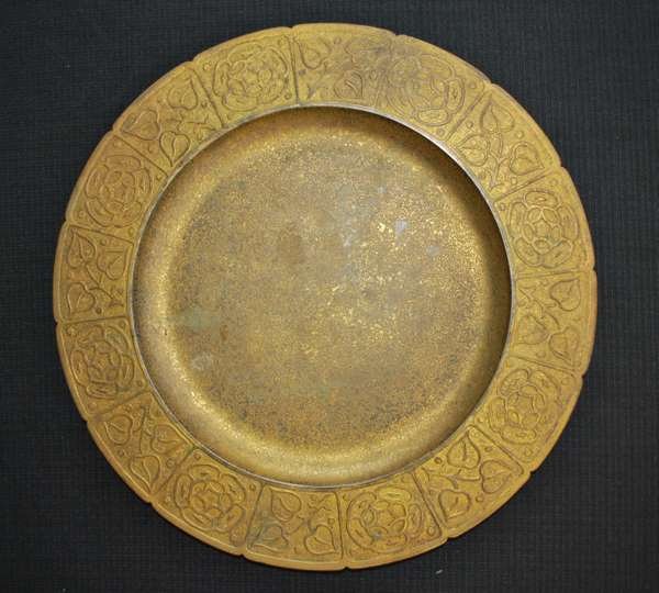 TIFFANY STUDIOS BRONZE PLATE: 1.5" BORDER OF SQUARES WITH LEAVES & FLOWER DECOR, SIGNED "TIFFANY STUDIOS, NEW YORK" & "1612", 10" DIAMETER, BUYER ARRANGES SHIPPING, WE CAN RECOMMEND LOCAL SHIPPER.