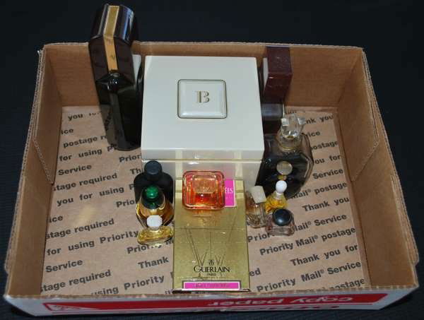 13PC BOX LOT OF PERFUME ITEMS: MISC. MIXTURE OF ITEMS INCL; LANCOME, CALVIN KLEIN, NINA RICCI, ETC.BUYER ARRANGES SHIPPING WE CAN RECOMMEND