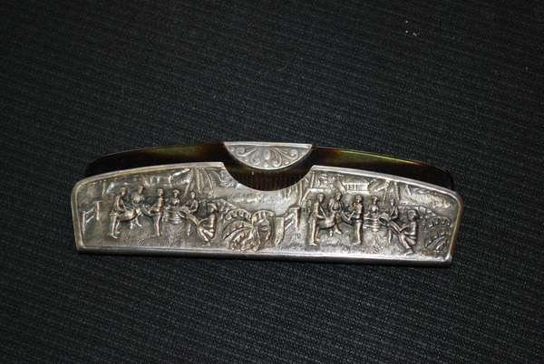 CELLULOID COMB / STERLING CASE: ANTIQUE CELLULOID COMB WITH VERY ORNATE STERLING SILVER CARRYING CASE AND HANDLE, HIDE AWAY SLIDER, DEPICTING ASIAN MARKET SCENE, CIRCA 1920 BUYER ARRANGES SHIPPING WE CAN RECOMMEND