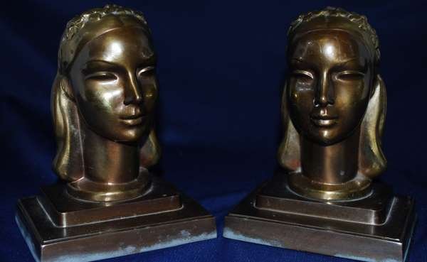 FRANKART BUST BOOKENDS: PAIR OF BRASS PLATED BOOKENDS MODELED AS YOUNG FEMALE HEAD, CIRCA 1930's, MARKED "FRANKART. INC. PAT. APPLD.FOR.", SIT 6.25" HIGH, BUYER ARRANGES SHIPPING, WE CAN RECOMMEND LOCAL SHIPPER.
