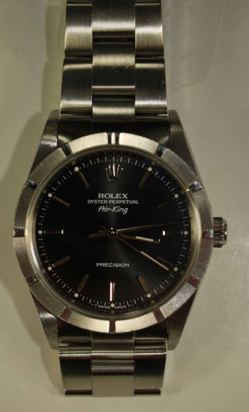 MENS S/S ROLEX AIRKING 1990'S: WITH BOX AND BOOKLET BLACK DIAL FULL SIZE BAND WATCH LIKE NEW BUT BACK HAS BEEN PERSONALIZED COMES WITH BOX AND BOOKLET PLUS SHIPPING