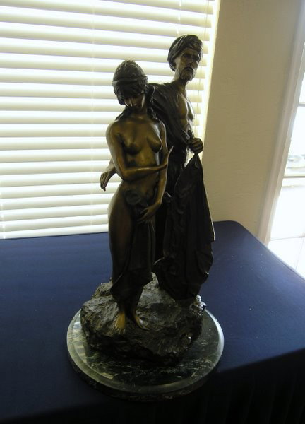 BRONZE STATUE MAN & WOMAN: LARGE BRONZE STATUE OF A TURKISH MAN WITH A WOMAN 28" TALL ON A MARBLE BASE HAS SIGNITURE SHIPPING NOT INCLUDED