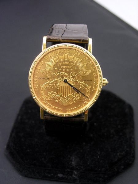 18KT Y.G. CORUM $20.00 GOLD WATCH: QUARTZ MOVEMENT WITH ORIGINAL 18KT BUCKLE AND CORUM ALLIGATOR BAND WITH DIAMOND CROWN PLUS SHIPPING