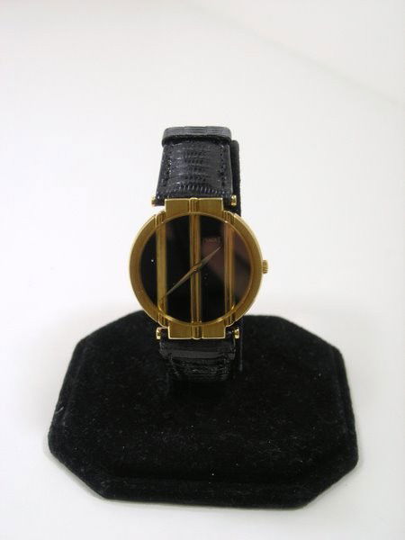 MENS 18KT PIAGET POLO: BLACK ONYX DIAL ORIGINAL BAND AND BUCKLE QUARTZ MOVEMENT WITH BOX PLUS SHIPPING