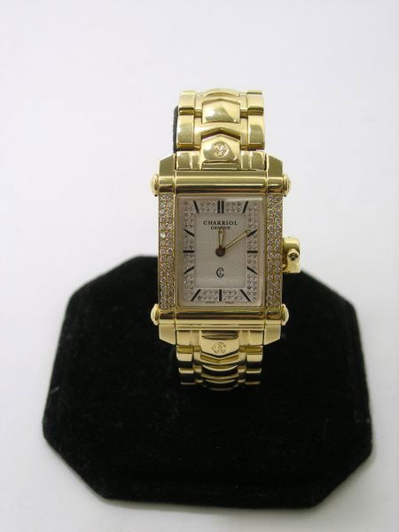 MENS 18KT Y.G. PHILIPPE CHARRIOL COLVMVS: SET WITH APPROX. 2.00CT FACTORY F-G COLOR VS QUALITY DIAMONDS FULL SIZE TANK 29MM WIDE WITH CROWN TWT 153.5 GRAMS NEW LIST APPROX. 20,000.00 WATCH IS NEW PLUS SHIPPING