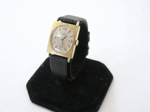 14KT Y.G. LONGINES DIAMOND WATCH: CIRCA 1960'S MANUAL WIND TANK WITH ORIGINAL DIAMOND DIAL BRUSH FINISH ON TOP OF CASE BUYER ARRANGES SHIPPING
