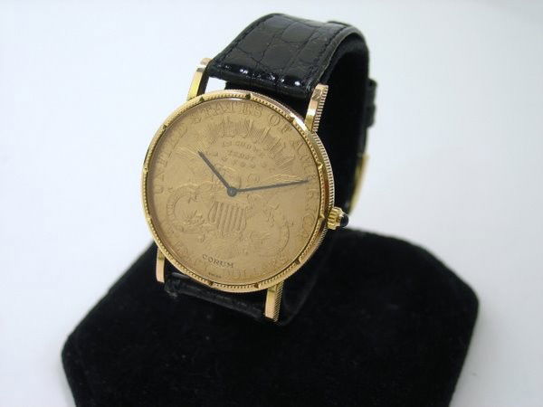 $20.00 CORUM LIBERTY COIN WATCH: MANUAL WIND IN 18KT CASE COIN DATED 1888 BUYER ARRANGES SHIPPING