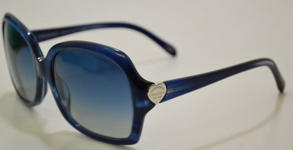 NEW TIFFANY LADY'S SUNGLASSES: MODEL 4041 SHEILD LENSES WITH HEART ACCENTS ON HINGES, COMES WITH BOX, PAPERS, CLEANING CLOTH, HARD CASE AND SOFT CASE. BUYER ARRANGES SHIPPING