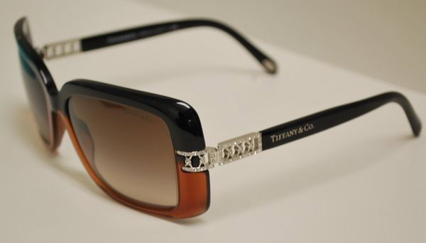 NEW TIFFANY LADY'S SUNGLASSES: MODEL 4025-B THICK FRAME SUNGLASSES WITH RHINESTONE ACCENTS. COMES WITH BOX, PAPERS, HARD CASE, SOFT CASE AND CLEANING CLOTH. BUYER ARRANGES SHIPPING