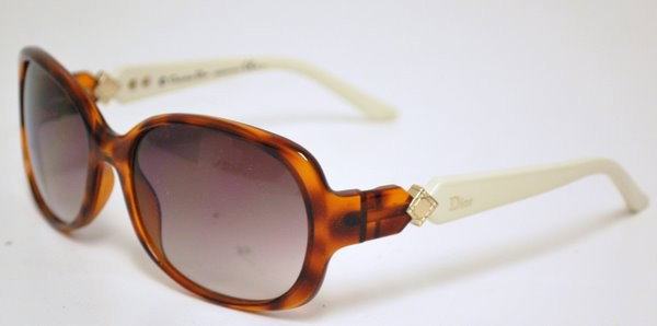 NEW DIOR SUNGLASSES: MODEL ZEMIRE2. TORTOISE SHELL COLORED FRAMES WITH BEIGE ARMS AND GOLD ACCENTS. COMES WITH BOX, PAPERS, HARD CASE AND CARRYING BAG, BUYER ARRANGES SHIPPING