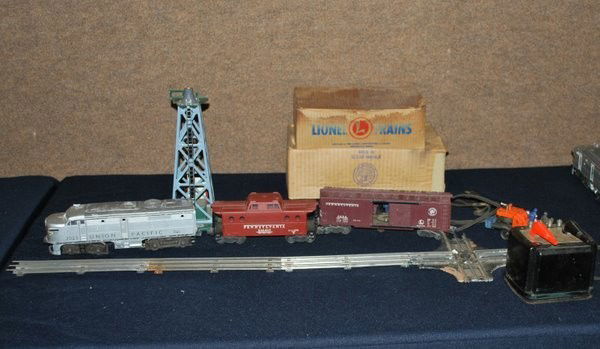 LIONEL TRAIN SET CIRCA 1950's: LIONEL TRAIN SET (1950's) CONSISTING OF 0-GAUGE # 2023 TWIN DIESEL LOCOMOTIVE WITH MAGNE TRACTION IN ORIGINAL BOX , ONE CABOOSE, #N5C, ONE DOUBLE DOOR BOXCAR, #5-53, ONE MULTI CONTROL TRANSFORMER,#103