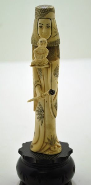 SMALL IVORY WOMAN WITH SCEPTER: SMALL IVORY OF A WOMAN HOLDING A SCEPTER AND WISEMAN OR PRIEST, 8 " TALL ON A WOOD BASE. ( not for export )