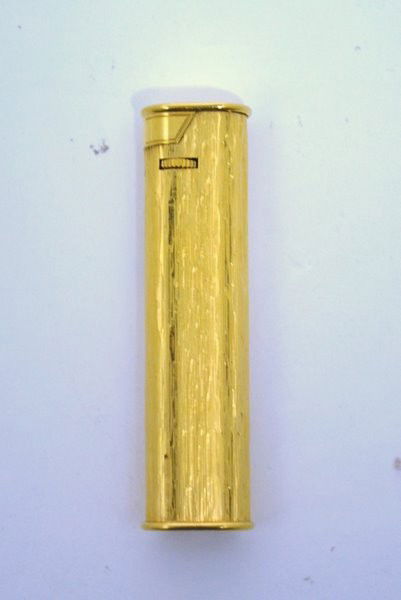 DUNHILL TALL LIGHTER: SWISS MADE WITH PATENT NUMBER, GOLD TONE PLATED, WORKING IN GREAT CONDITION.