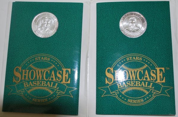 BASEBALL COMMEMORATIVE SILVER MEDALLIONS: JOHNNY BENCH & YOGI BERRA ENCASED, .999 SILVER MEDALLION FEATURES A REPLICA OF THE PLAYER AND HIS SIGNATURE, PLAYERS NAME,IDENTIFYING CITY, TWO STATS AND YEAR OF ISSUE ( 1992 )