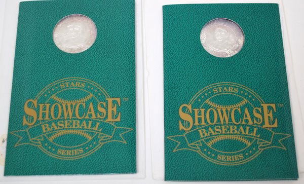 BASEBALL COMMEMORATIVE SILVER MEDALLIONS: WHITEY FORD & YOGI BERRA ENCASED, .999 SILVER MEDALLION FEATURES A REPLICA OF THE PLAYER AND HIS SIGNATURE, PLAYERS NAME,IDENTIFYING CITY, TWO STATS AND YEAR OF ISSUE ( 1992 )