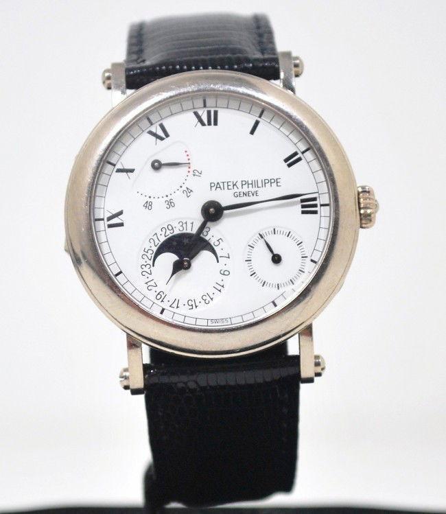 18KT W.G. PATEK PHILIPPE MODEL # 5054: AUTOMATIC OFFICER CASE MOONPHASE CALENDER POWER RESERVE 29 JEWEL 38MM CASE WITH CROWN HAS BOX AND PAPERS