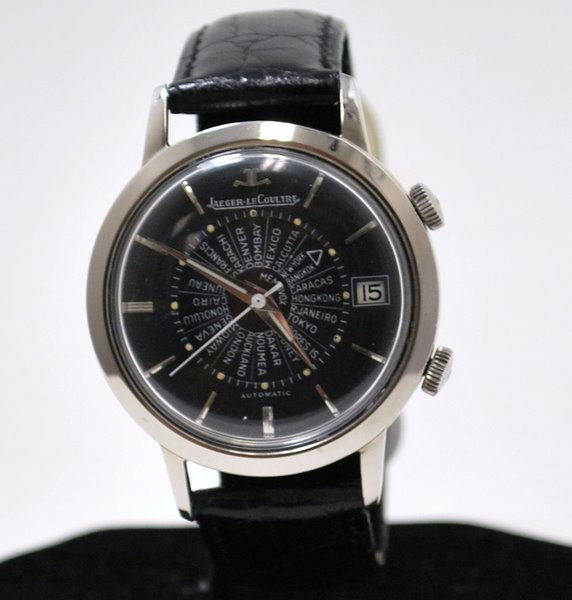 JAEGER LECOULTRE MEMOVOX WORLD TIME ALARM: CIRCA 1950S NEW OLD STOCK, BLACK AND SILVER DIAL, ALL ORIGINAL.