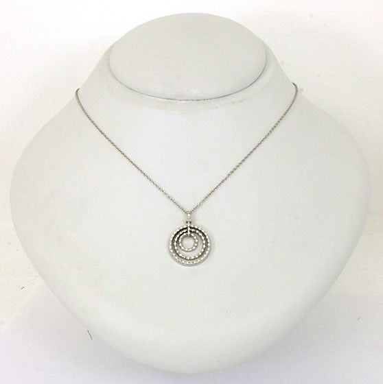 ROBERTO COIN 18KT W.G. & DIAMOND PENDANT: ROUND FORM PENDANT SET WITH 34PTS OF ROUND CUT DIAMONDS CHAIN IS 14 1/4" 7.3 GRAMS TWT.