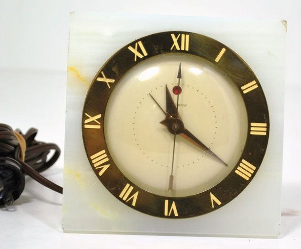VINTAGE ART DECO TELECHRON CLOCK: MODEL # 7F57 " THE SPORTSMAN " IN WORKING CONDITION, CIRCA 1935 WITH ONYX CASE ON MARBLE, 5 1/4 X 5 1/4 X 3 "