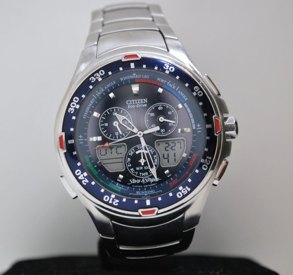 MENS S/S CITIZEN ECO DRIVE: S/S CASE AND BAND WITH SINGLE DEPLOYMENT, FEATURES A BLUE DIAL WITH BLUE ROTATING BEZEL, 46 MM CASE SIZE W/ CROWN. COMES WITH BOX