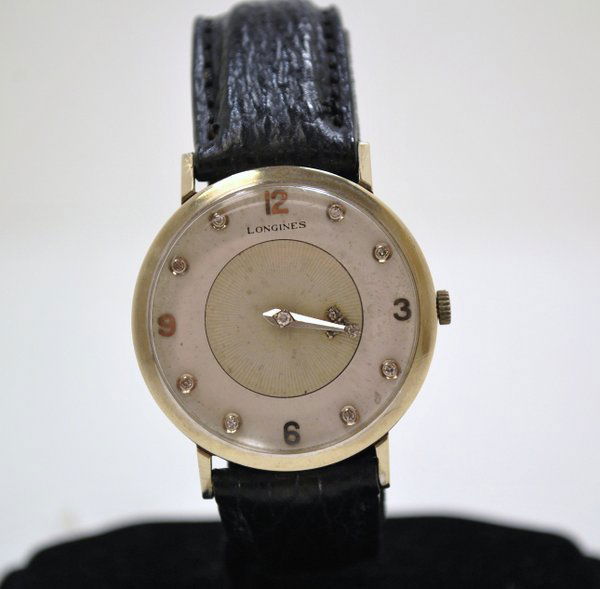 14KT W.G. LONGINES MYSTERY DIAMOND DIAL: GREAT LOOKING DIAL WITH MARKERS AT 12, 3, 6 AND 9. DIAMOND ARROW REPLACES THE HOUR HAND, THE MINUTE HAND ALSO FEATURES A DIAMOND AT IT'S CENTER AND AT THE VERY TIP.