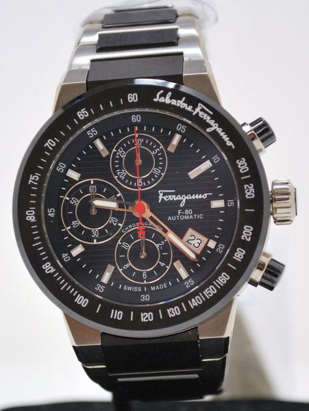 NEW FERRAGAMO S/S BLACK CHRONOGRAPH: GREAT SEE THROUGH BACK, SAPPHIRE CRYSTAL, MANUAL WIND WATCH 49MM CASE SIZE.