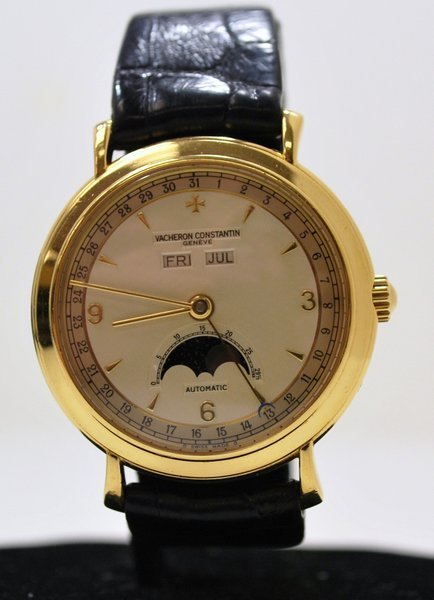 VACHERON CONSTANTIN 18KT CALENDAR WATCH: TRIPLE DATE "MOON" AUTOMATIC 1990S LIKE NEW, WITH ORIGINAL BUCKLE.