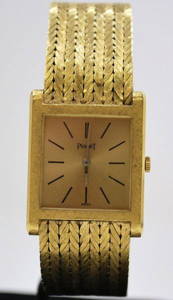 PIAGET 18KT WRISTWATCH: MANUAL WIND, CIRCA 1980S 7 1/2 INCH 18KT BAND, 66.28 GRAM TWT.