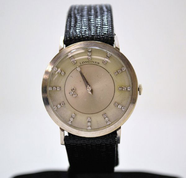 LONGINES 14KT MYSTERY DIAMOND DIAL: CIRCA 1950S, 41 DIAMONDS ON DIAL.