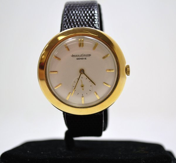 JAEGER-LECOULTRE 14KT Y.G. CIRCA 1940'S: MANUAL WIND OVER SIZE CASE HIDDEN LUGS DIAL APPEARS TO BE OLDER REDO 38MM CASE
