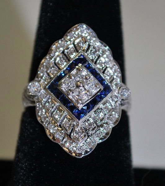14KT W.G. SAPPHIRE AND DIAMOND RING: ART DECO STYLE SET WITH APPROX. ,50CT DIAMONDS H-I COLOR SI QUALITY DIAMONDS PLUS ACCENT SAPPHIRES TWT 6.9 GRAMS SIZEABLE 7