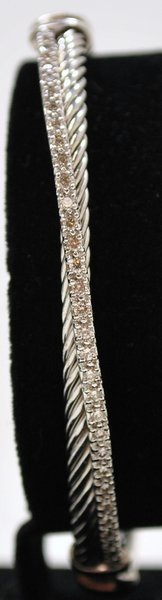DAVID YURMAN LADIES 14KT/STERLING DIAMOND BRACELET: SET WITH APPROX. .50CT G-H COLOR SI QUALITY DIAMONDS CLASSIC TWIST DESIGN SIGNED DY 925/585 ACCENTS ARE WHITE GOLD TWT 15.9 GRAMS WILL FIT UP TO 6.50" WRIST