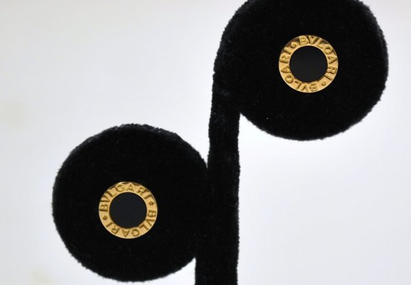 18KT Y.G. BVLGARI STUD EARRINGS: BLACK ONYX CENTER TWT 3.8 GRAMS SIGNED AND NUMBERED JUST OVER 1/3 " WIDE